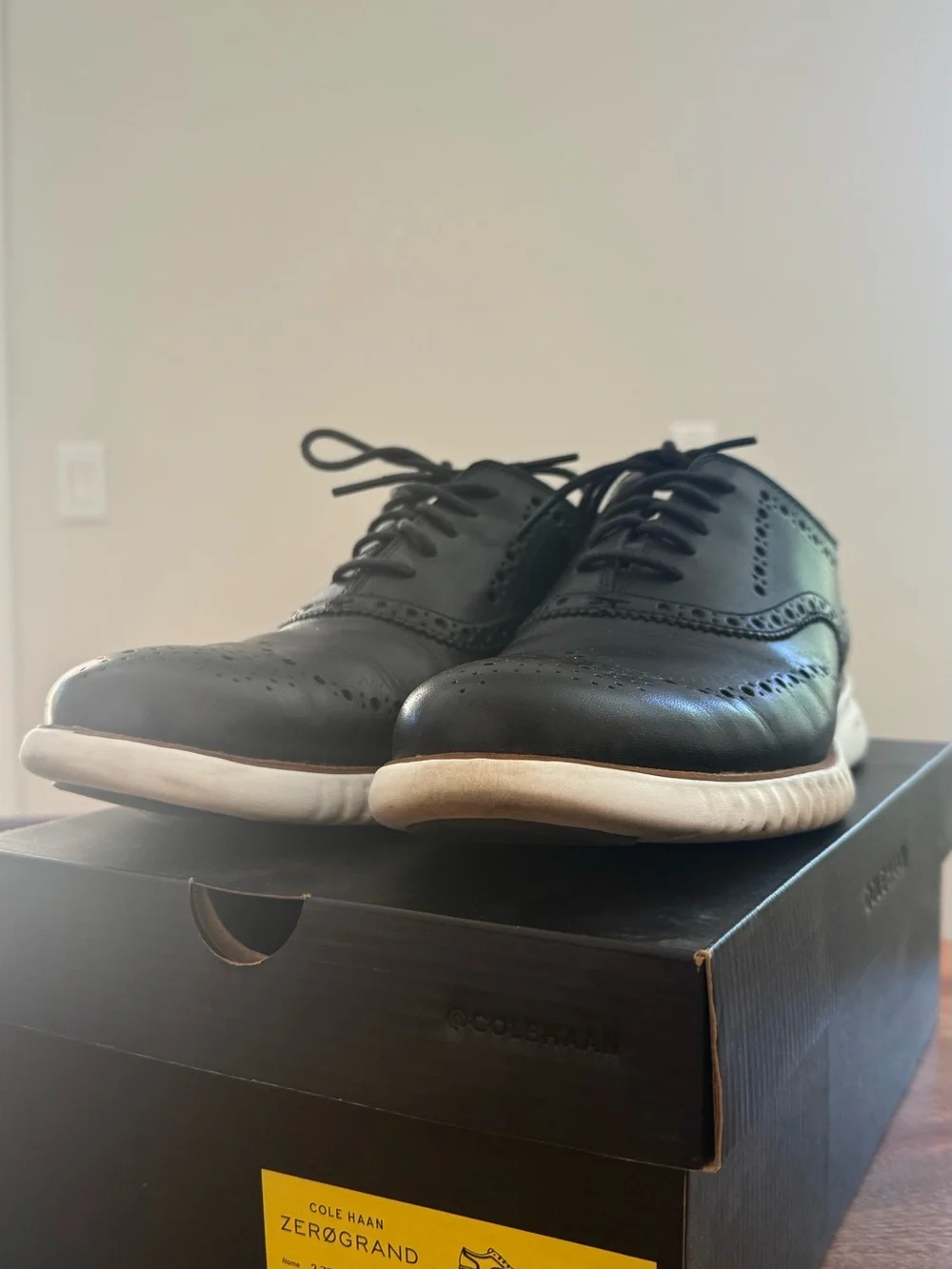 Cole Haan Black Leather Wingtip Oxfords with White Sole